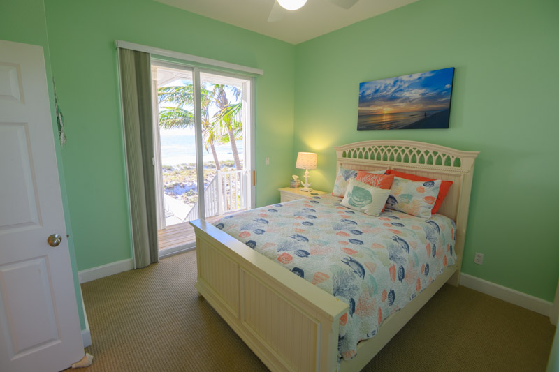 Bedroom #3 — ocean view with porch access