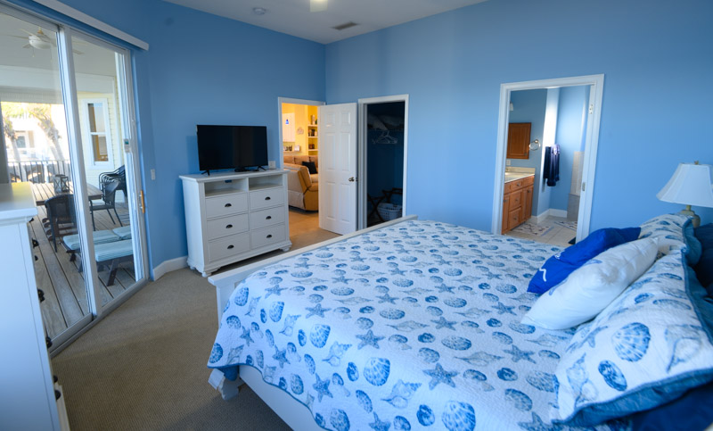 Master Bedroom + screened porch access